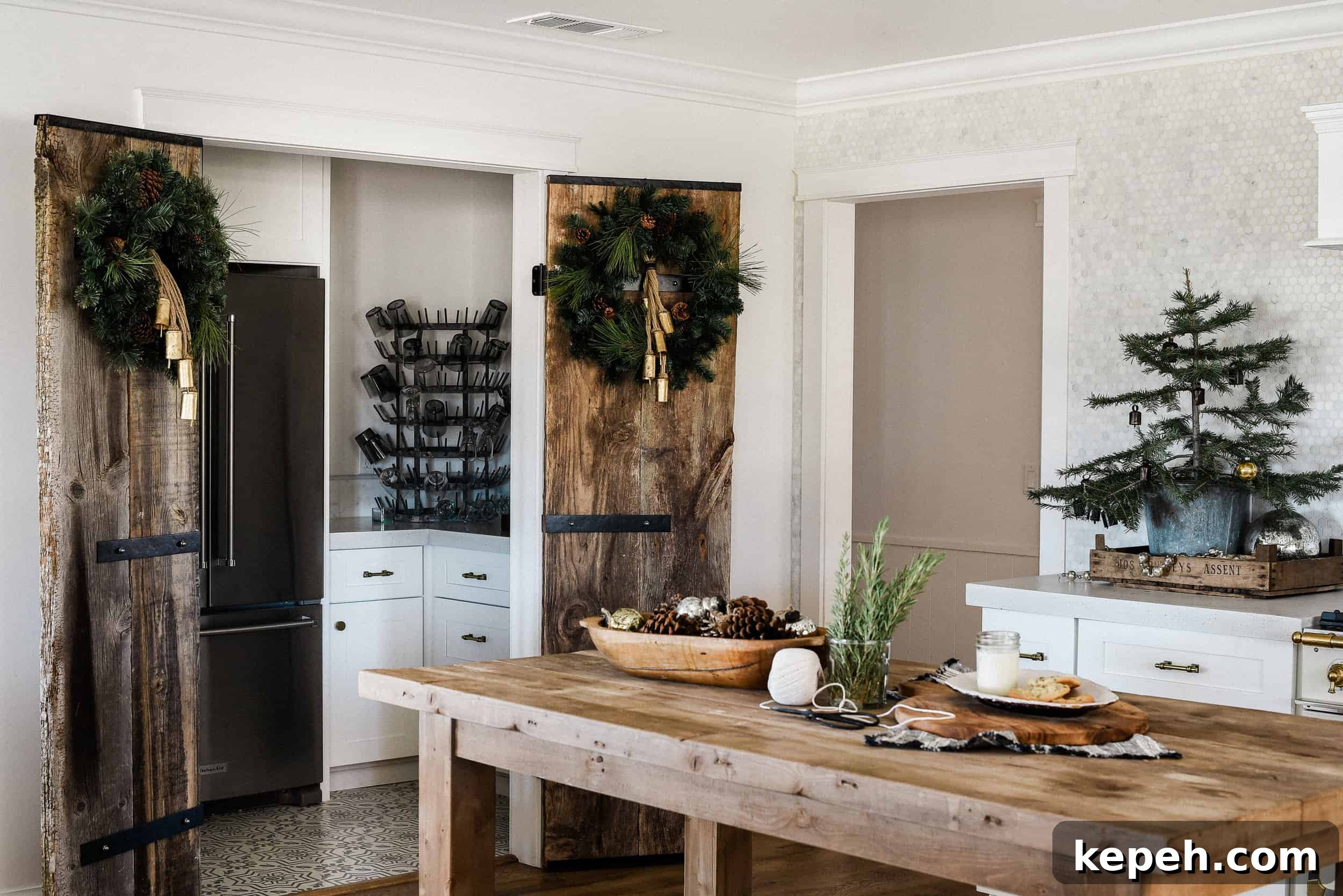 Farmhouse Christmas Kitchen Decorating Ideas for Cozy Holiday Charm 9 Tour our Christmas kitchen to gather ideas for decorating for the holidays this year! Use greenery and vintage touches to keep things simple and cohesive!