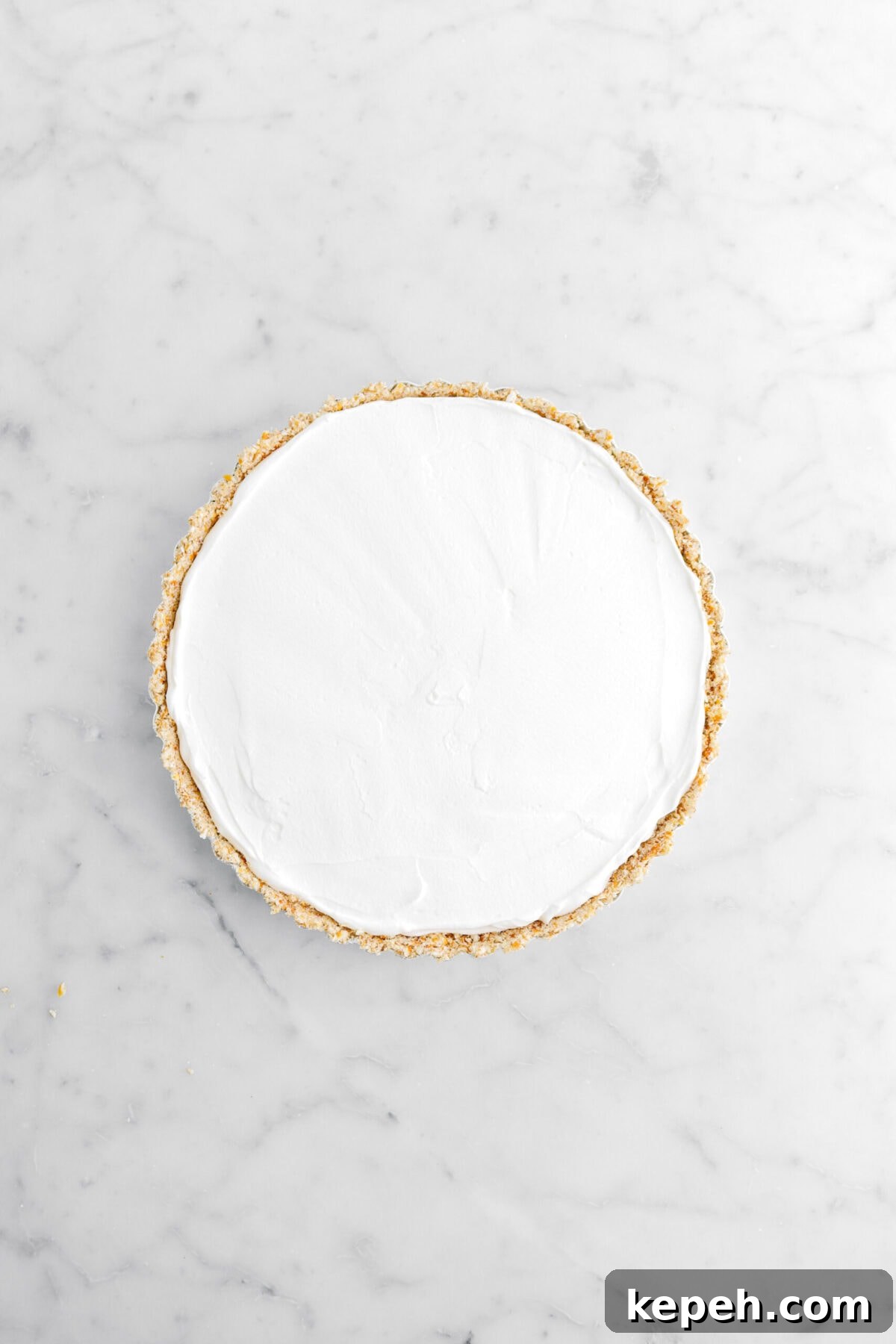 Strawberry Mascarpone Tart with Crunchy Pretzel Crust 16 whipped cream spread evenly in tart crust.