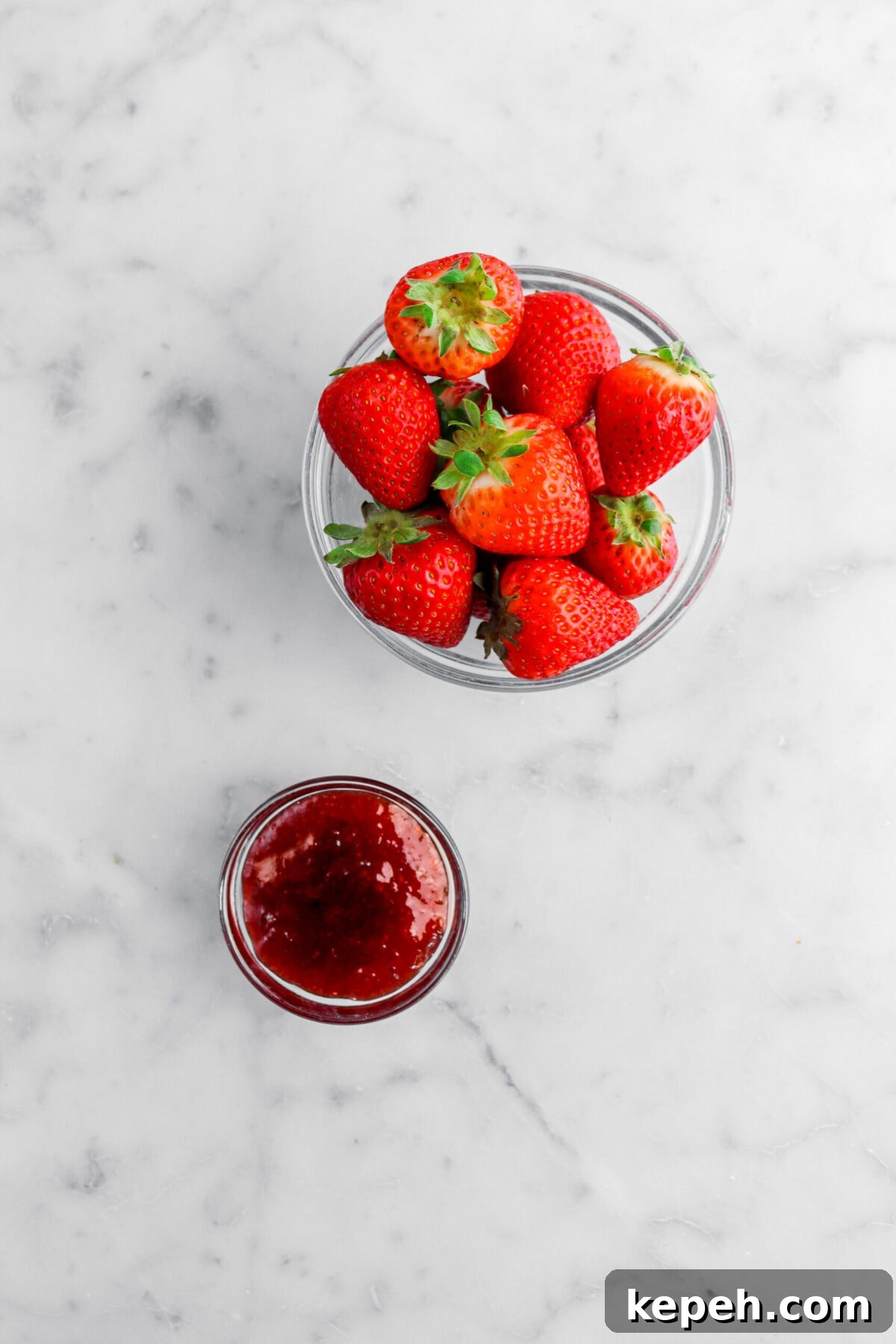Strawberry Mascarpone Tart with Crunchy Pretzel Crust 9 strawberries and jam in separate glass bowls.
