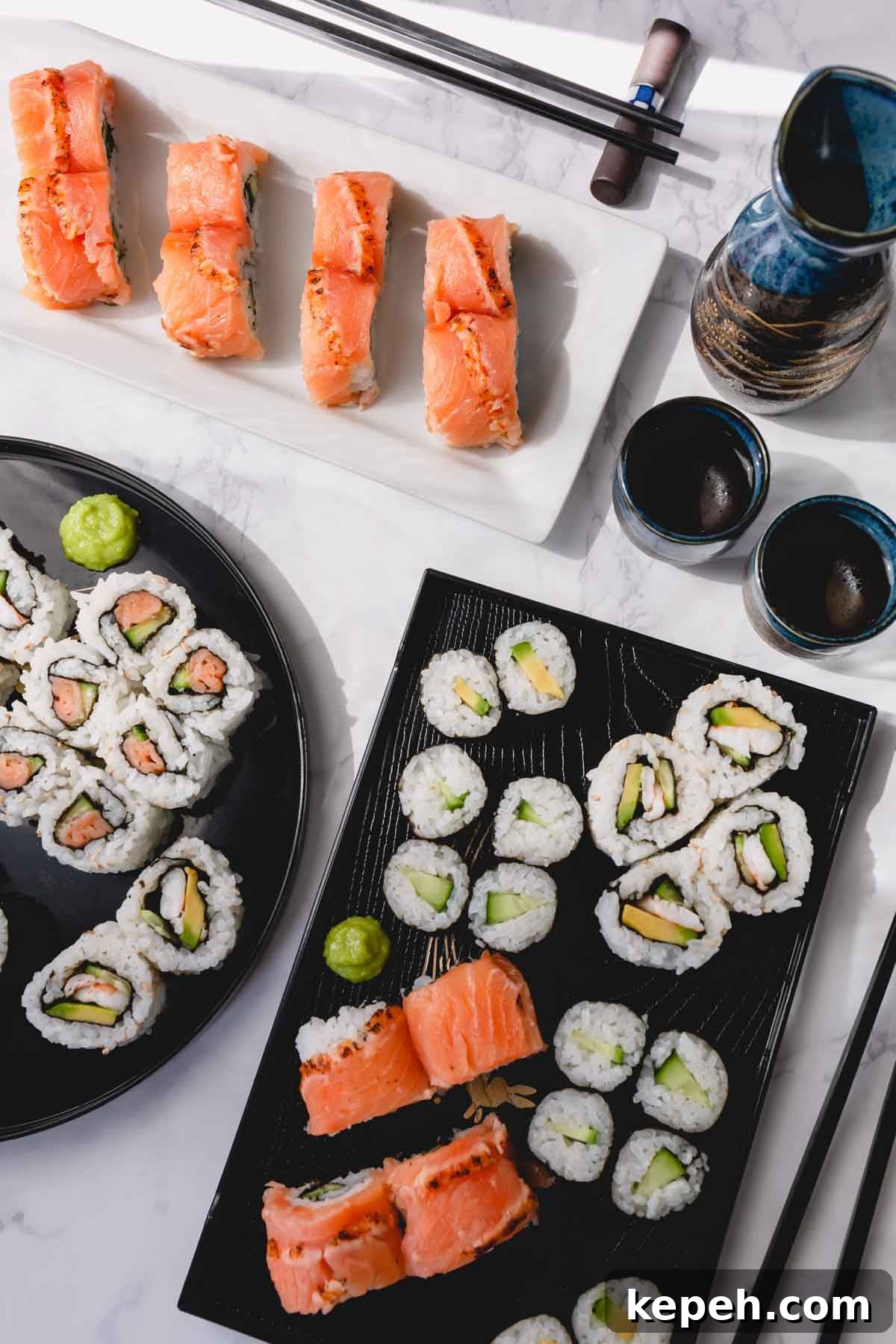 Homemade Sushi Roll Recipe: Step-by-Step Guide for Perfect Rolls 2 Various homemade sushi rolls on multiple platters.