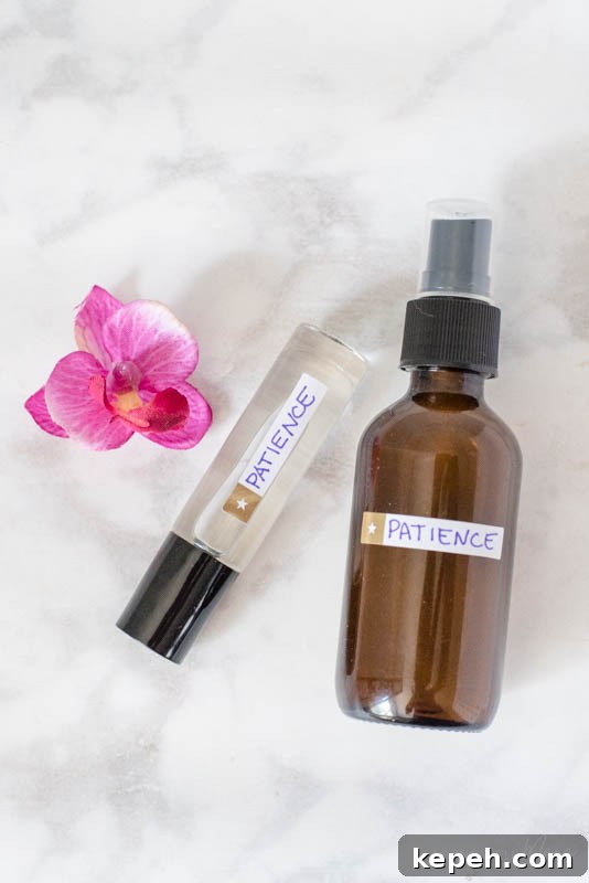 Renewed Patience: DIY Calming Essential Oil Blend for Moms 4 A flower next to Renewed Patience essential oil blend.
