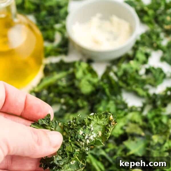 Perfectly Crispy Air Fryer Chicken Drumsticks Recipe 10 Picking up a kale chip.