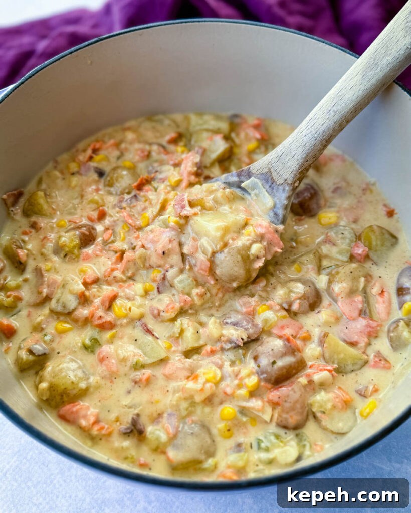 Creamy Salmon and Sweet Corn Chowder Recipe 9 creamy salmon chowder with corn and potatoes in a Dutch oven