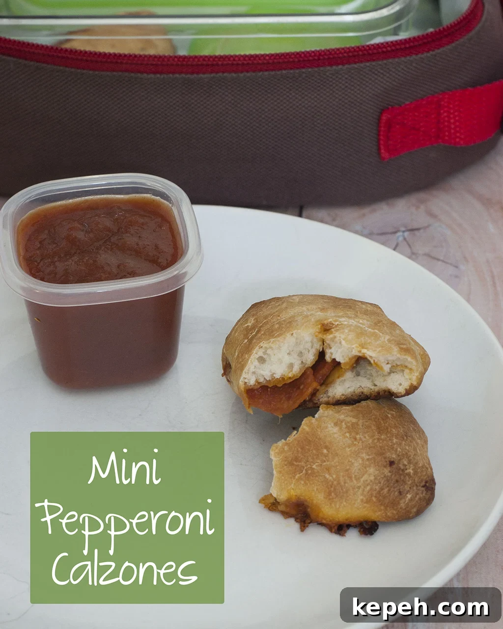 Mini Pepperoni Calzone Recipe: Crispy, Cheesy Hand Pies 6 You'll be parent of the year when you send your kids back to school with mini pepperoni calzones. They're easy to make in bulk and freeze. #SundaySupper TheRedheadBaker.com