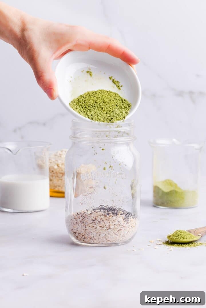 Match powder being added to matcha overnight oats jar