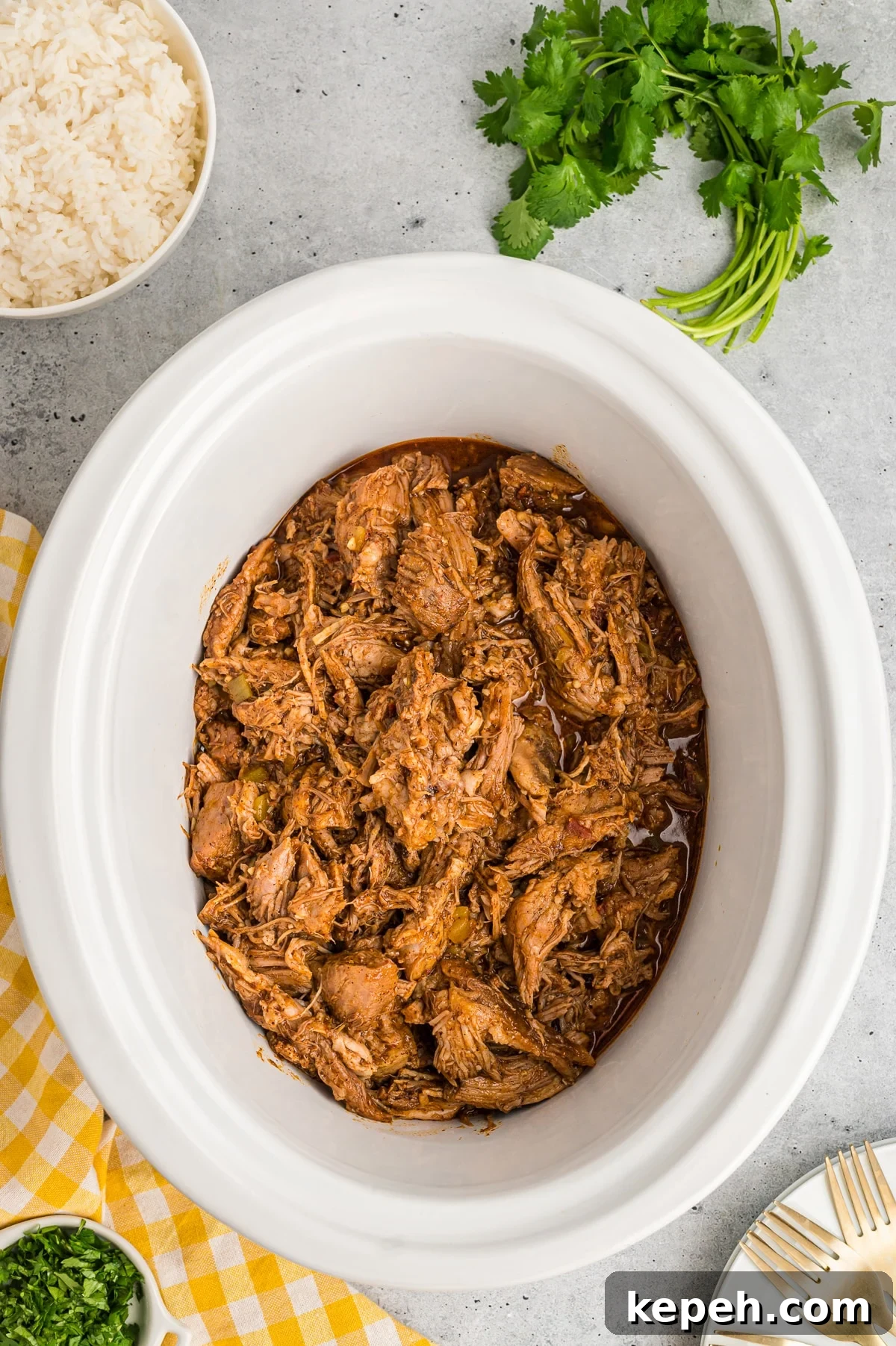 Cafe Rio Sweet Pork Recipe: Copycat Carnitas with Tangy Sauce 6 ready to serve cafe rio sweet pork in a crockpot.