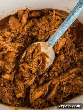 Cafe Rio Sweet Pork Recipe: Copycat Carnitas with Tangy Sauce 9 cafe rio pork shredded in a crockpot.