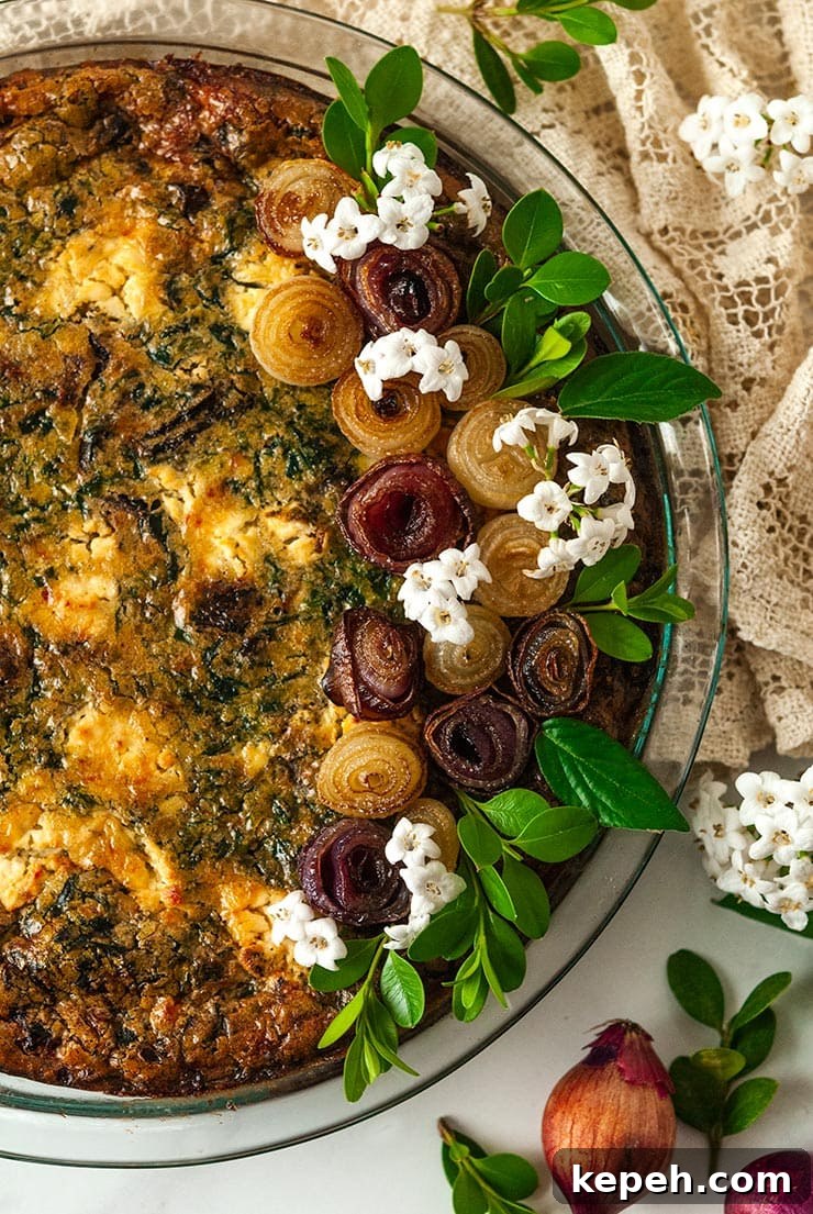 Quiche with spinach, goat cheese and caramelised onion