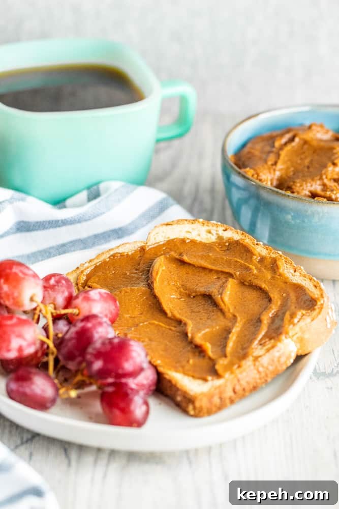 5-Minute Cookie Butter Recipe: Quick Homemade Spread 5 Cookie butter on toast on a white counter with coffee in background.