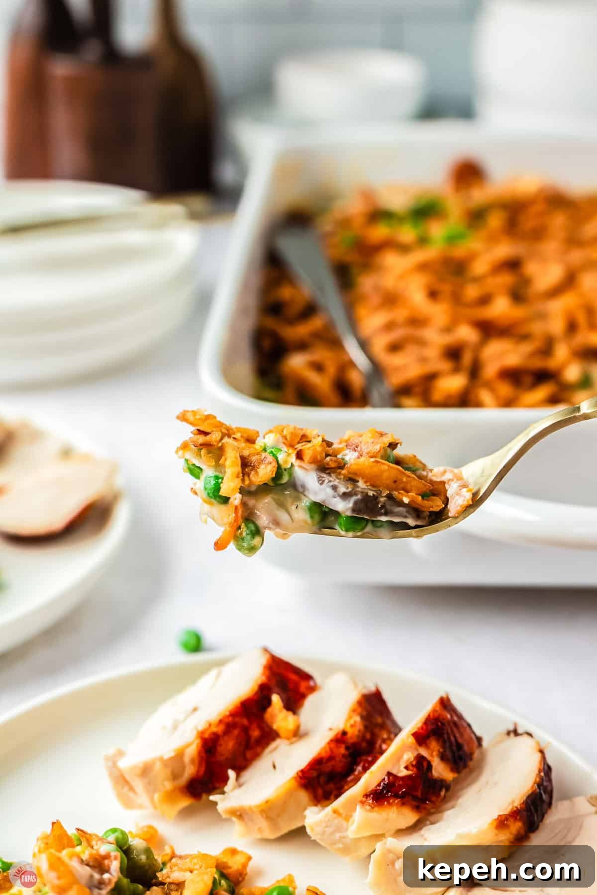 Classic Green Pea Casserole Recipe for Family Dinners 9 close up of fork with a bite of peas and mushrooms