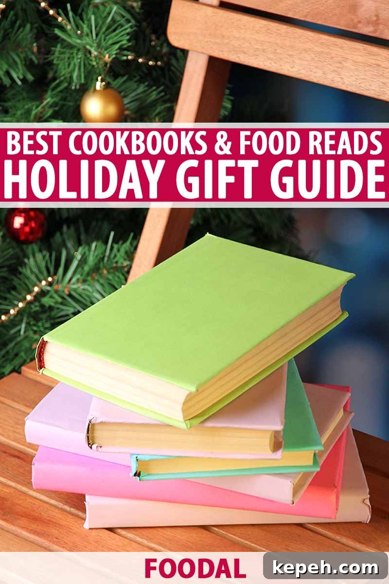 Vertical image of a pile of books with pastel green, purple, pink, and blue covers on a wooden folding chair, in front of an evergreen tree decorated for the holidays, printed with red and white text.
