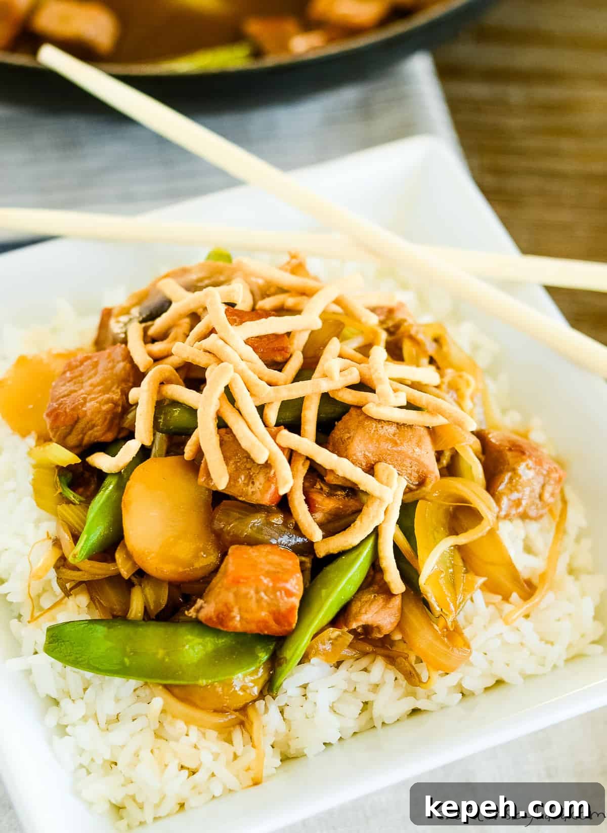 Classic Pork Chop Suey Recipe for Authentic Chinese Takeout Taste 6 chopsuey topped with crunchy chow mein noodles