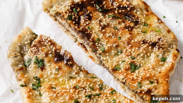 Baked Keema Naan cut in half