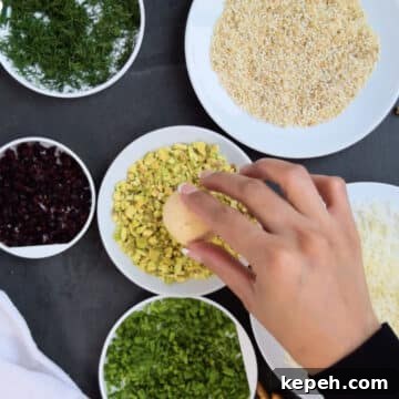 Savory ball being rolled in various toppings. 