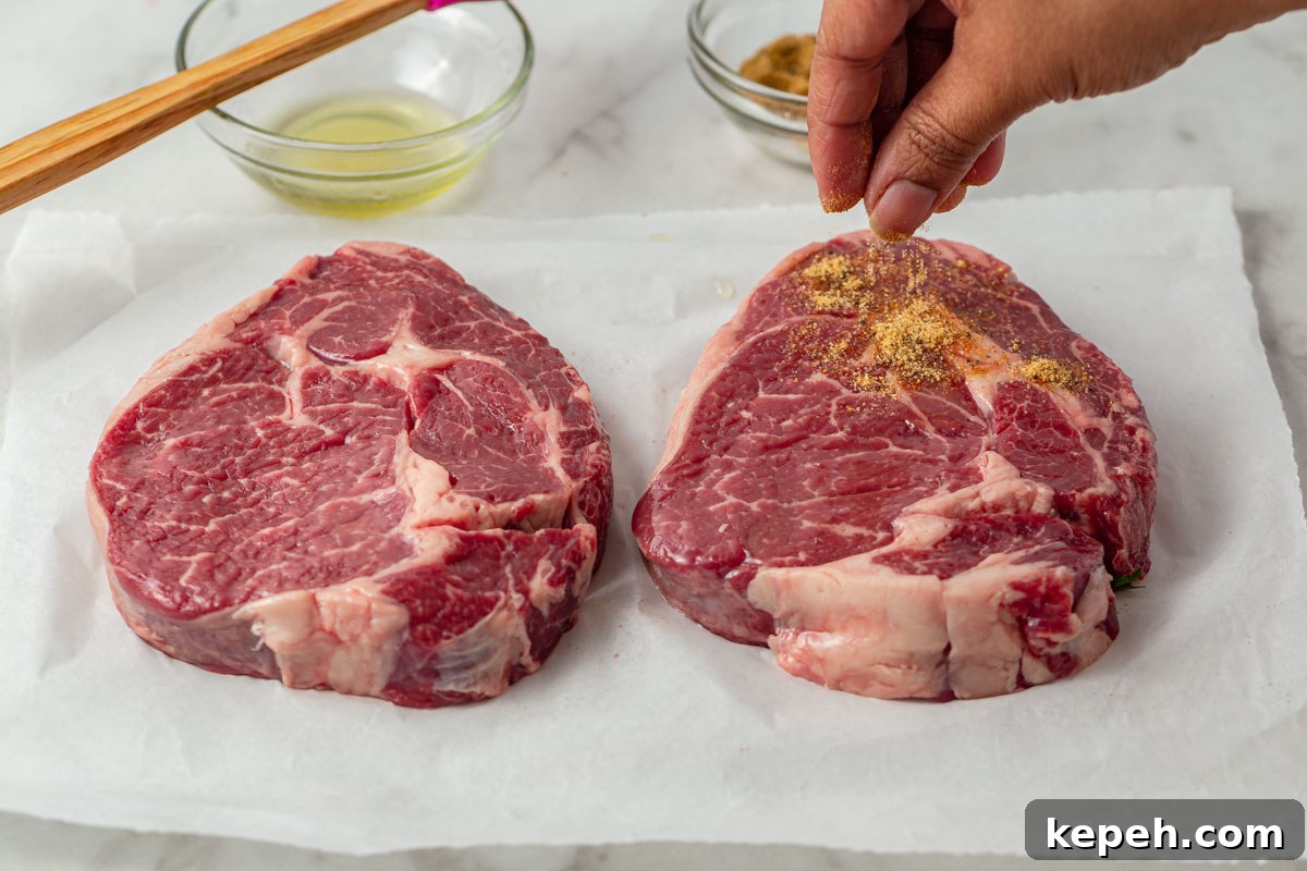 Perfect Ribeye Steak in the Air Fryer: Juicy, Quick Method 5 coating the steak with spices.