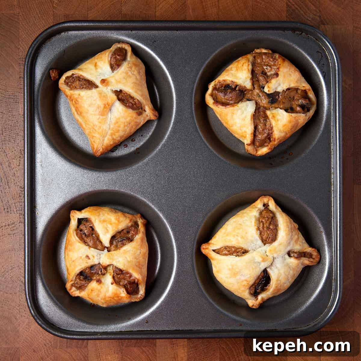 Photo of the cooked vegan mushroom feuilletees still in the baking tray, straight out of the oven.