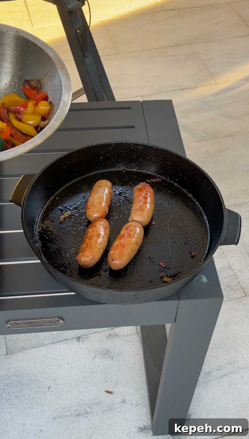 Sausage and peppers topped with provolone