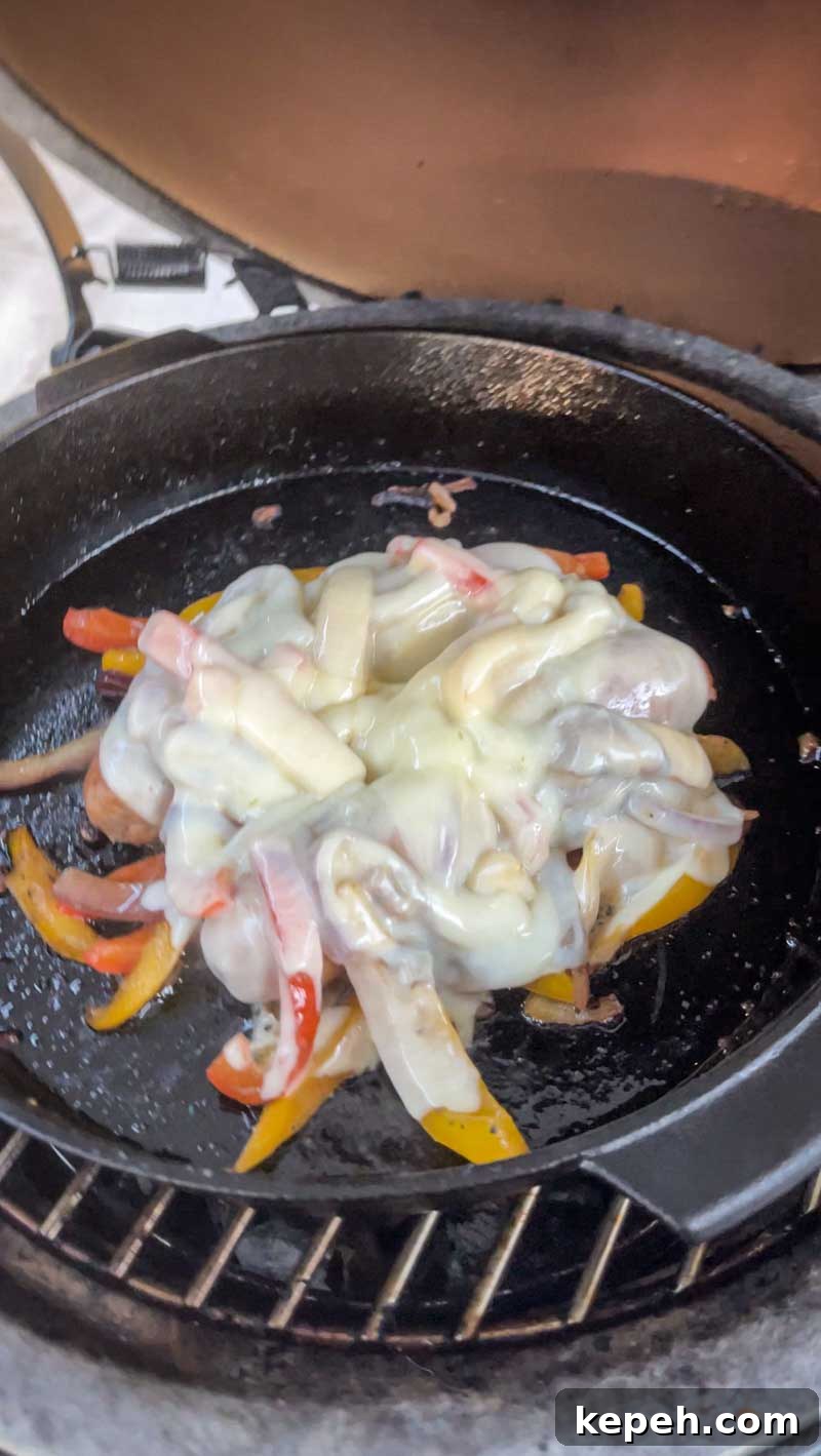 Sausage and peppers with melted cheese