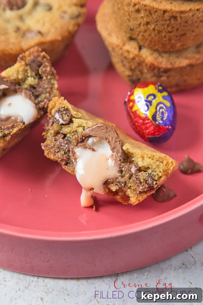 Soft and chewy chocolate chip cookies stuffed with a mini Cadbury Creme Egg. The perfect, easy Easter bake!