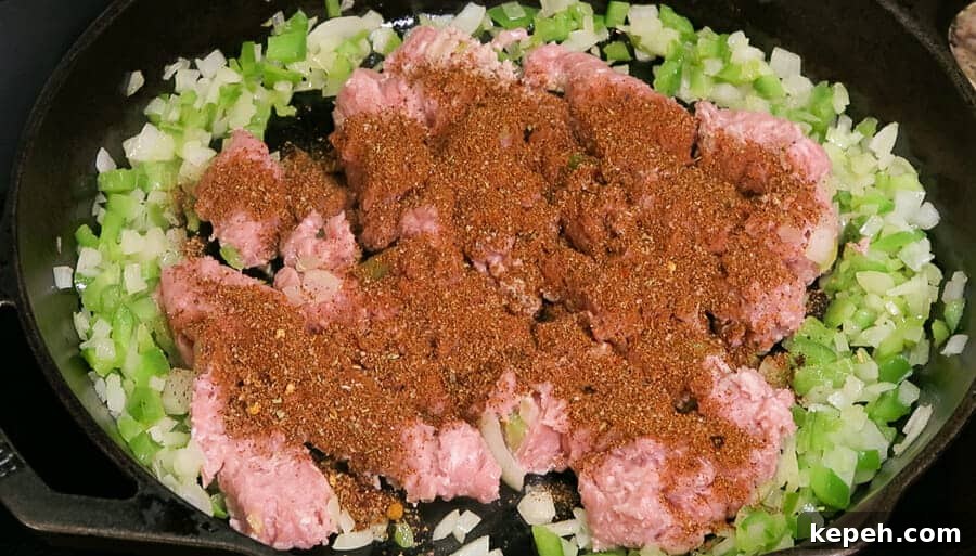 Homemade Taco Seasoning Recipe That Beats Store Mixes 5 taco seasoning being used on ground turkey