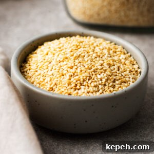 How to Toast Sesame Seeds on the Stove or in the Oven 12 Toasted sesame seeds in a small ceramic bowl.