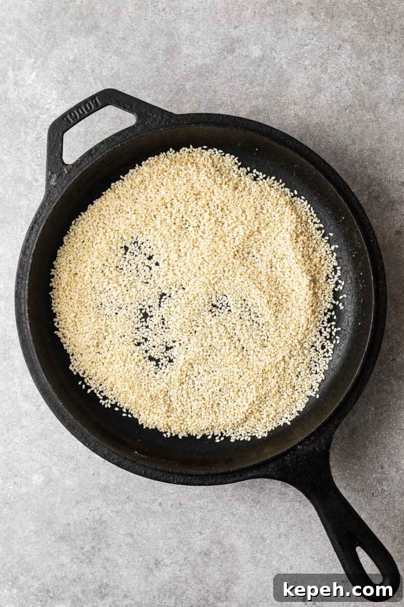 How to Toast Sesame Seeds on the Stove or in the Oven 7 Raw sesame seeds in a skillet.