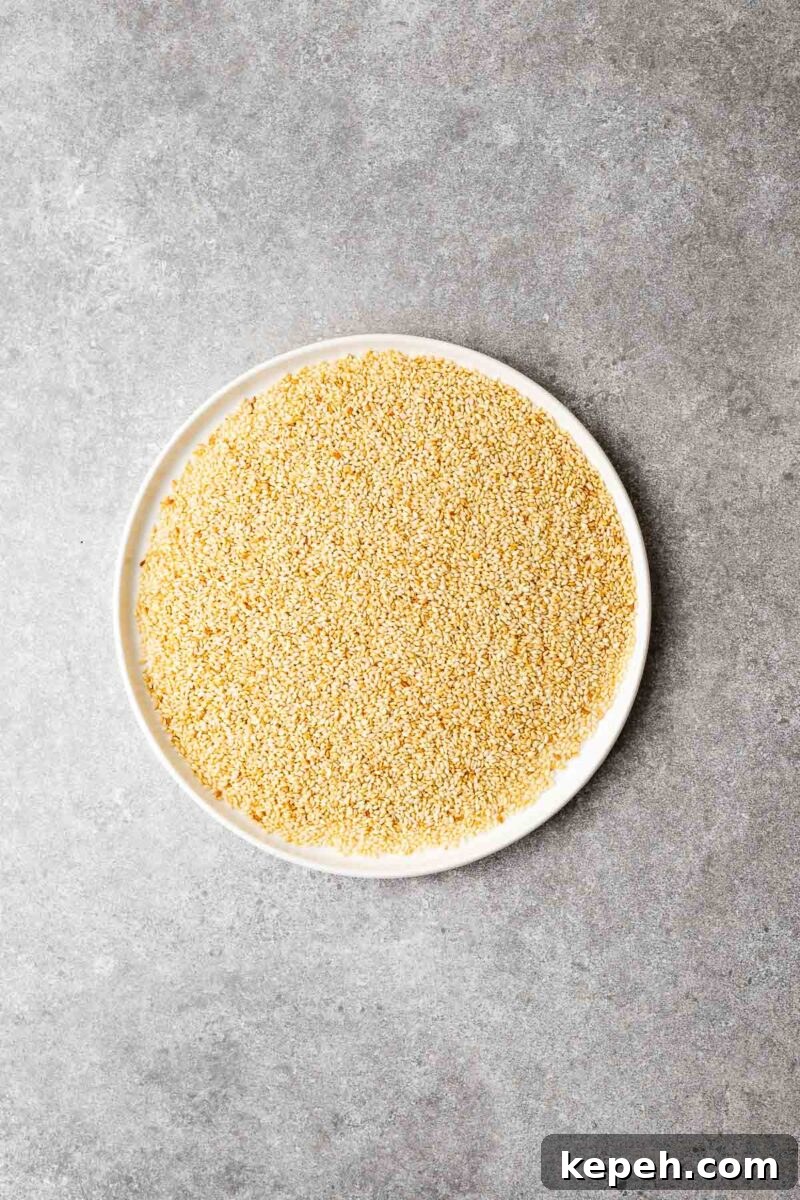 How to Toast Sesame Seeds on the Stove or in the Oven 9 A plate with stovetop toasted sesame seeds.