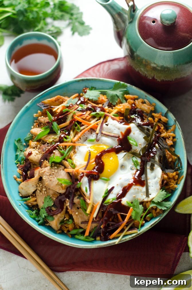 Korean Chicken and Kimchi Fried Rice Bowls Recipe 2 Korean Chicken and Kimchi Fried Rice Bowls. These spicy Asian-inspired bowls will make you want to never order takeout again. | hostthetoast.com