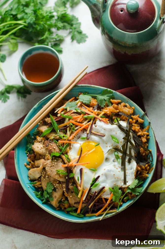 Korean Chicken and Kimchi Fried Rice Bowls Recipe 3 Korean Chicken and Kimchi Fried Rice Bowls. These spicy Asian-inspired bowls will make you want to never order takeout again. | hostthetoast.com