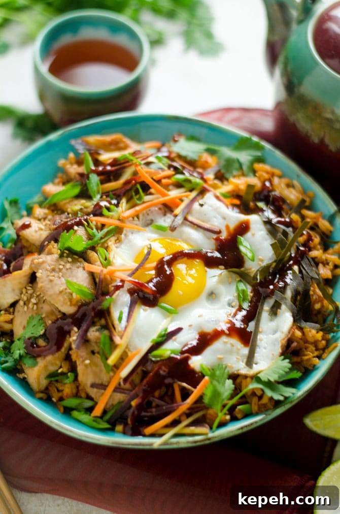Korean Chicken and Kimchi Fried Rice Bowls Recipe 4 Korean Chicken and Kimchi Fried Rice Bowls. These spicy Asian-inspired bowls will make you want to never order takeout again. | hostthetoast.com