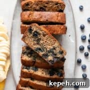 Healthy oil-free blueberry banana bread, made with almond and oat flour.