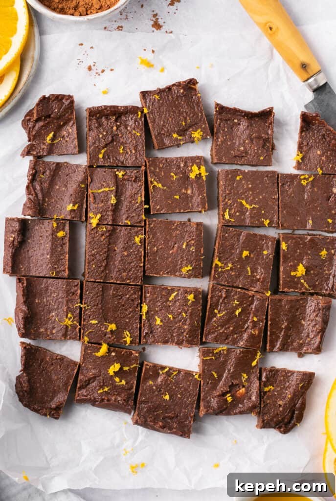 No-Bake Orange Chocolate Fudge Recipe: Zesty Cocoa Treat 8 A batch of orange chocolate fudge cut into square pieces.