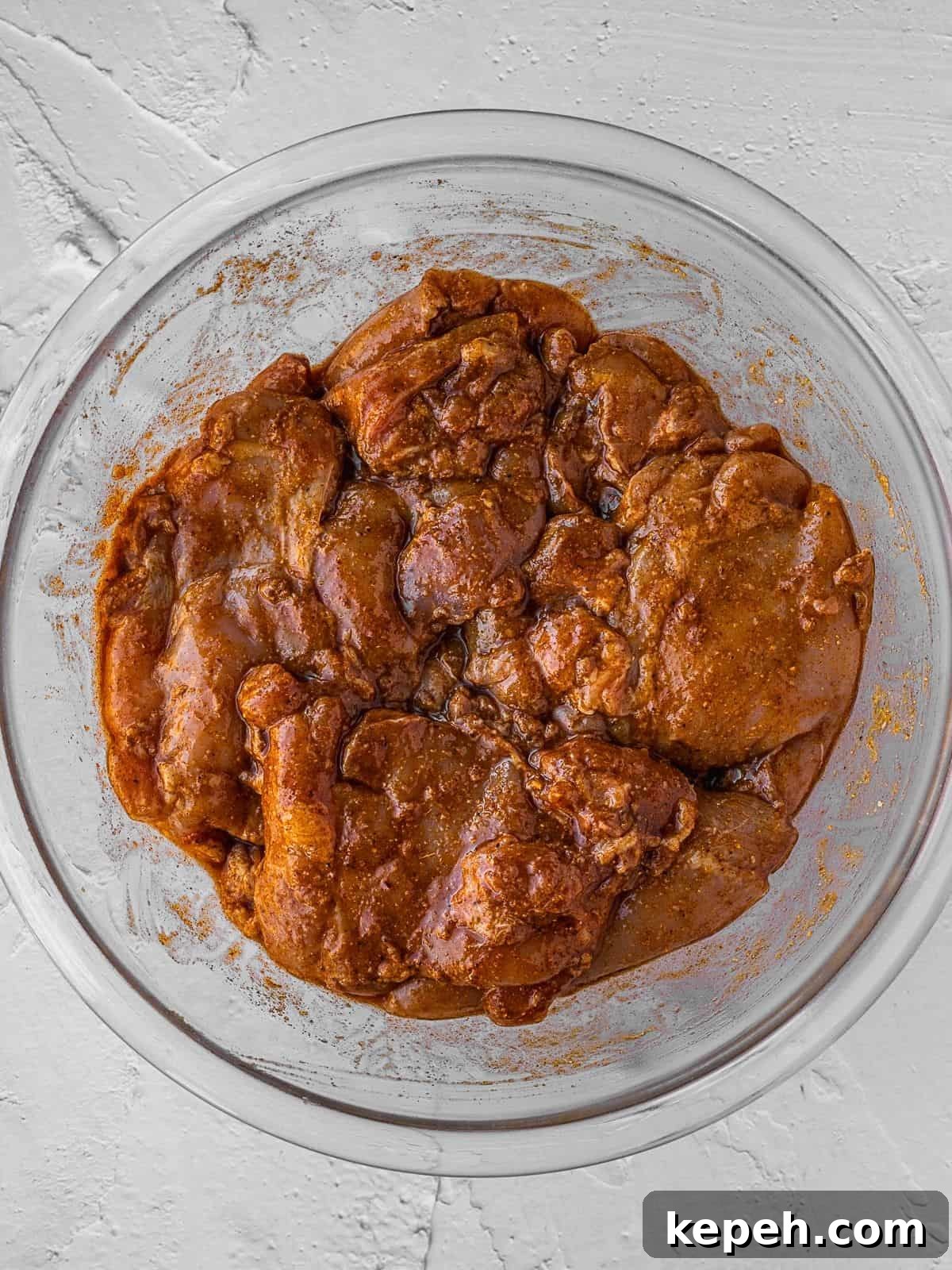 Lebanese Chicken Shawarma Recipe: Wraps or Bowls Made at Home 5 Bowl of marinating chicken thighs.
