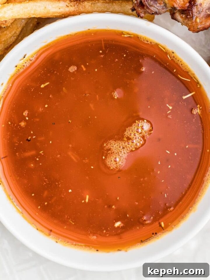 close up of a bowl of cajun butter sauce.