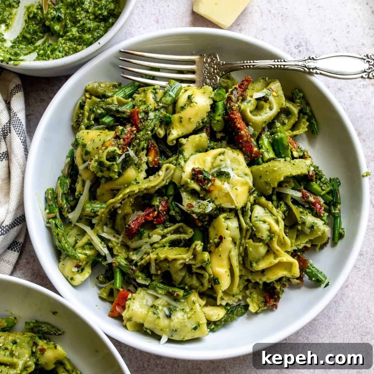 Pesto With Tortellini in a white bowl
