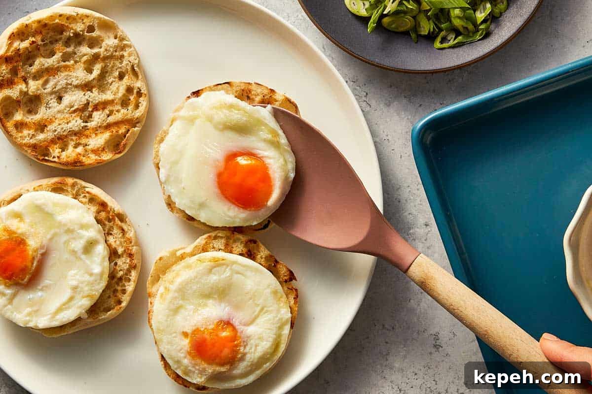 poached egg being spooned into a toast