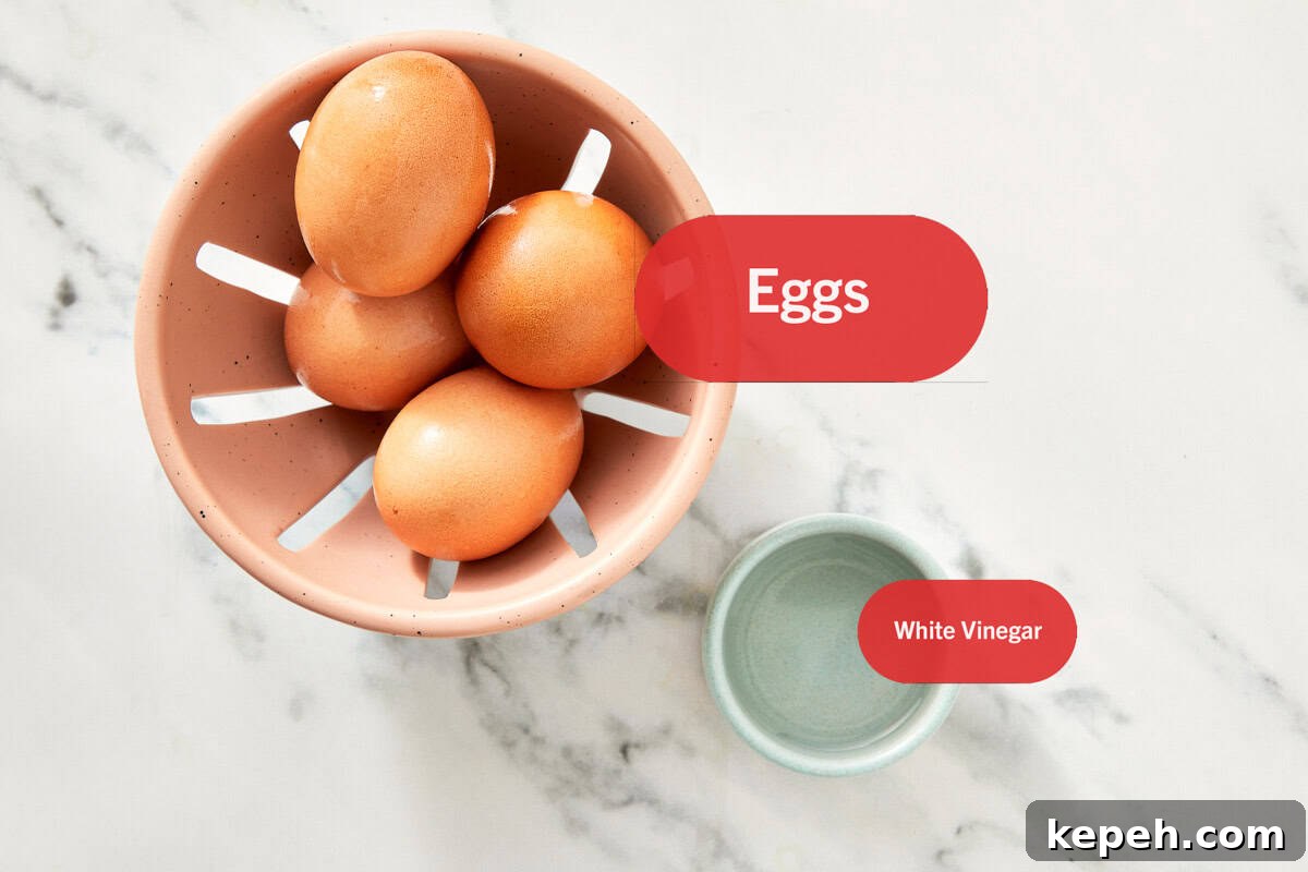 Top-down view of poached egg ingredients labeled: four raw eggs and white vinegar in small bowls on a marble surface.