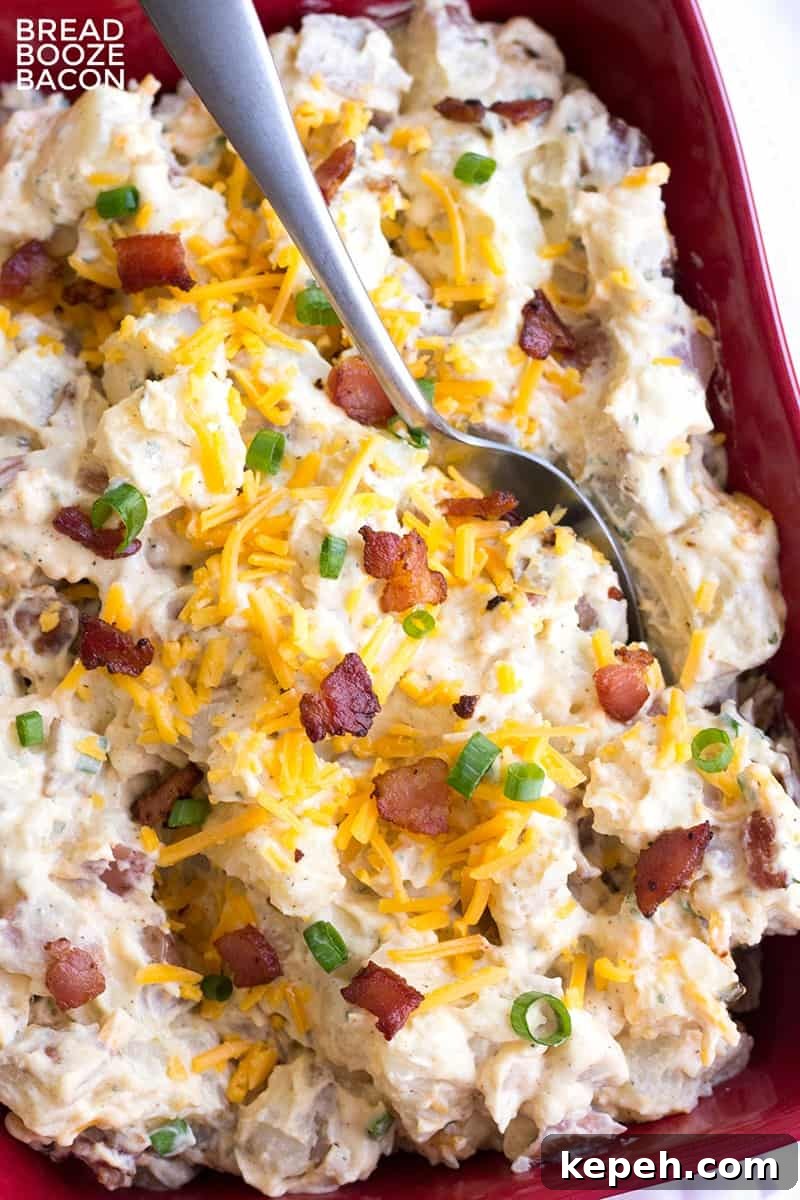 Loaded Bacon Ranch Potato Salad Recipe for Summer BBQs 5 Loaded Bacon Ranch Potato Salad is a flavorful side dish that's perfect for potlucks or your next game day party!