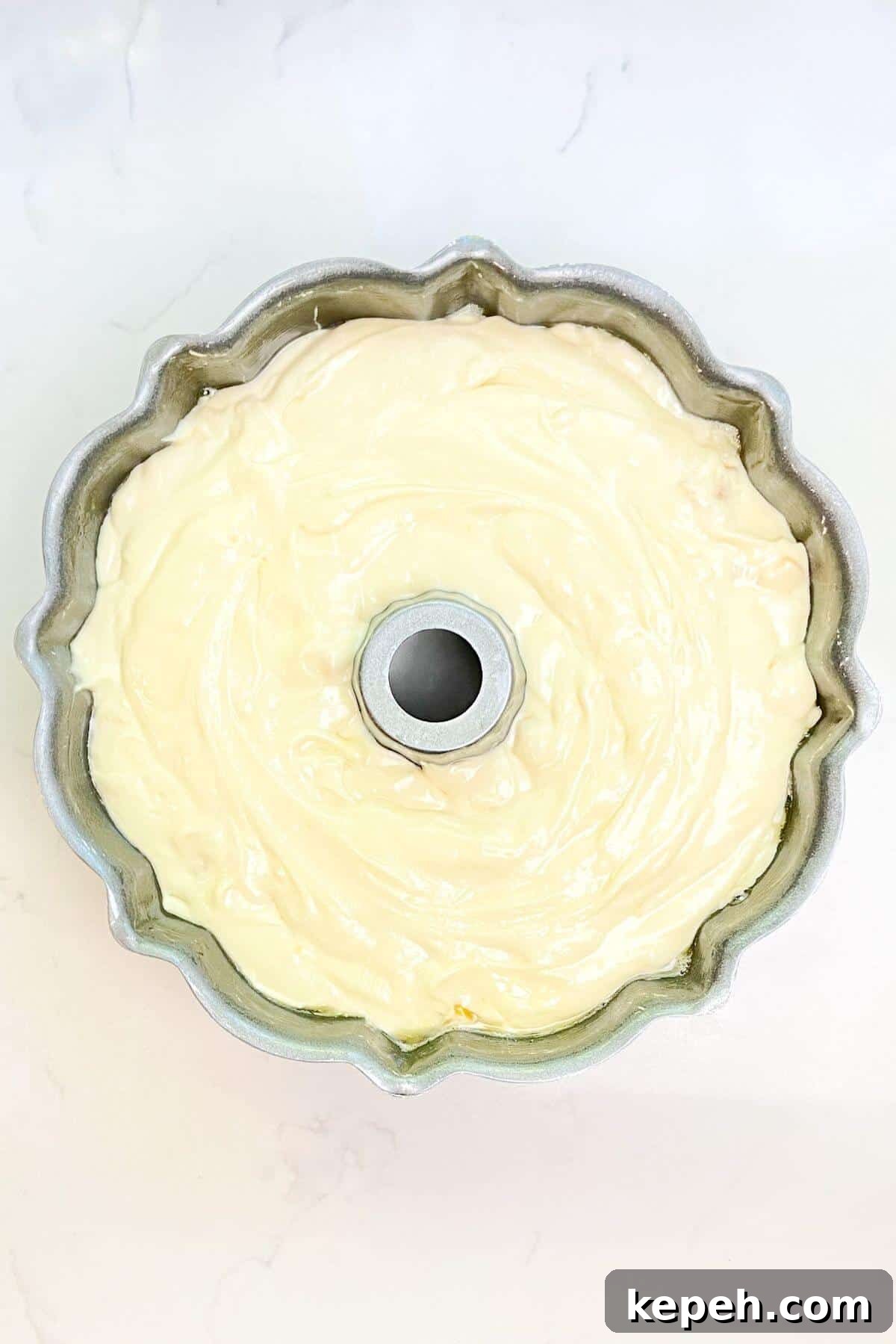 Batter poured into bundt pan.