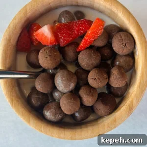 Homemade Cocoa Puffs Cereal: Crunchy Chocolate Breakfast Recipe 9 Cocoa puffs cereal served with strawberries.