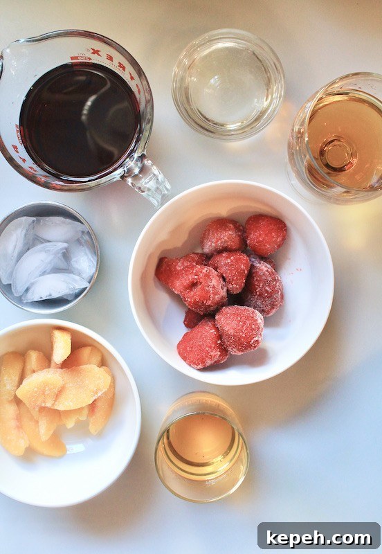 Strawberry Peach Wine Slushie Recipe — Frozen Summer Cocktail 4 frozen fruit