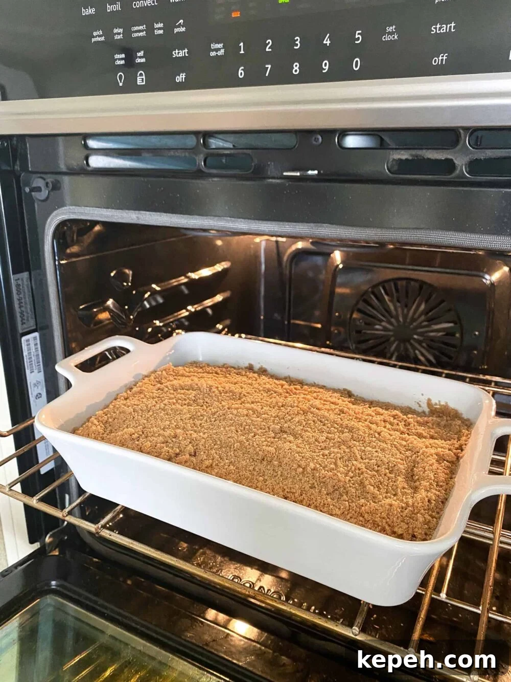 Starbucks Coffee Cake Copycat Recipe — Moist Streusel Coffee Cake 4 coffee cake in oven