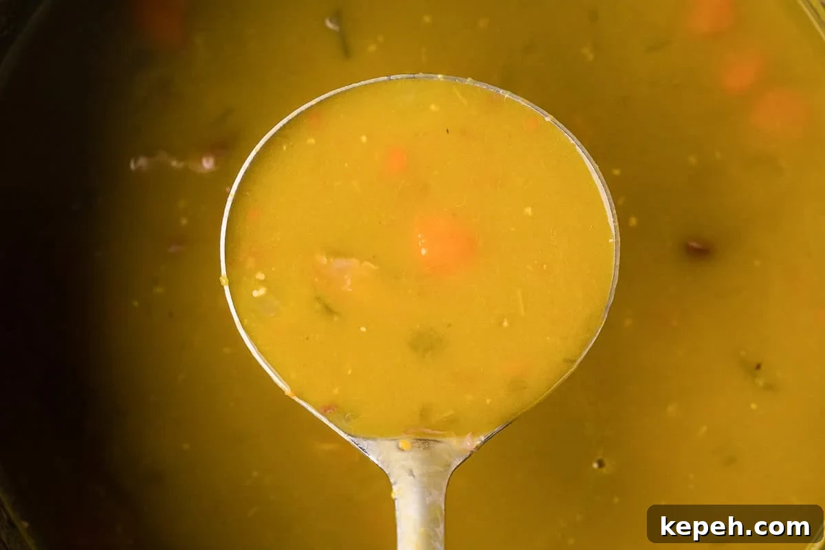 ladle of split pea soup.