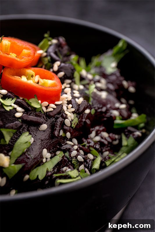 Black rice and wild mushrooms are the star of this one pot cooked on a base of onion, garlic & ginger, mixed with miso paste, mirin and vegetable stock then garnished with chilli, sesame seeds and coriander. It's a dark, rich and mysterious vegetarian and vegan one pot!