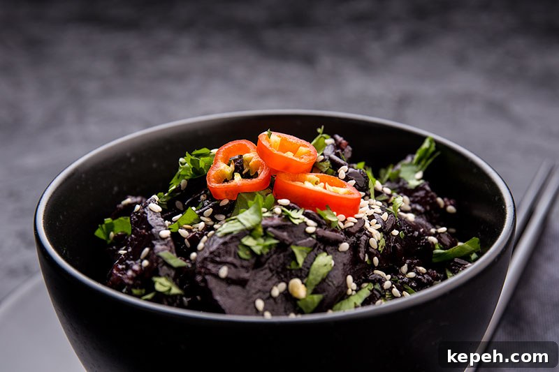 Black rice and wild mushrooms are the star of this one pot cooked on a base of onion, garlic & ginger, mixed with miso paste, mirin and vegetable stock then garnished with chilli, sesame seeds and coriander. It's a dark, rich and mysterious vegetarian and vegan one pot!
