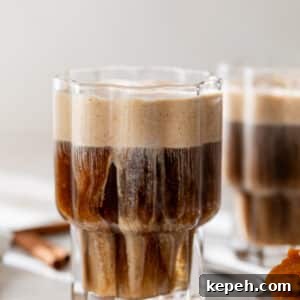 side view of a glass of pumpkin cream cold brew.