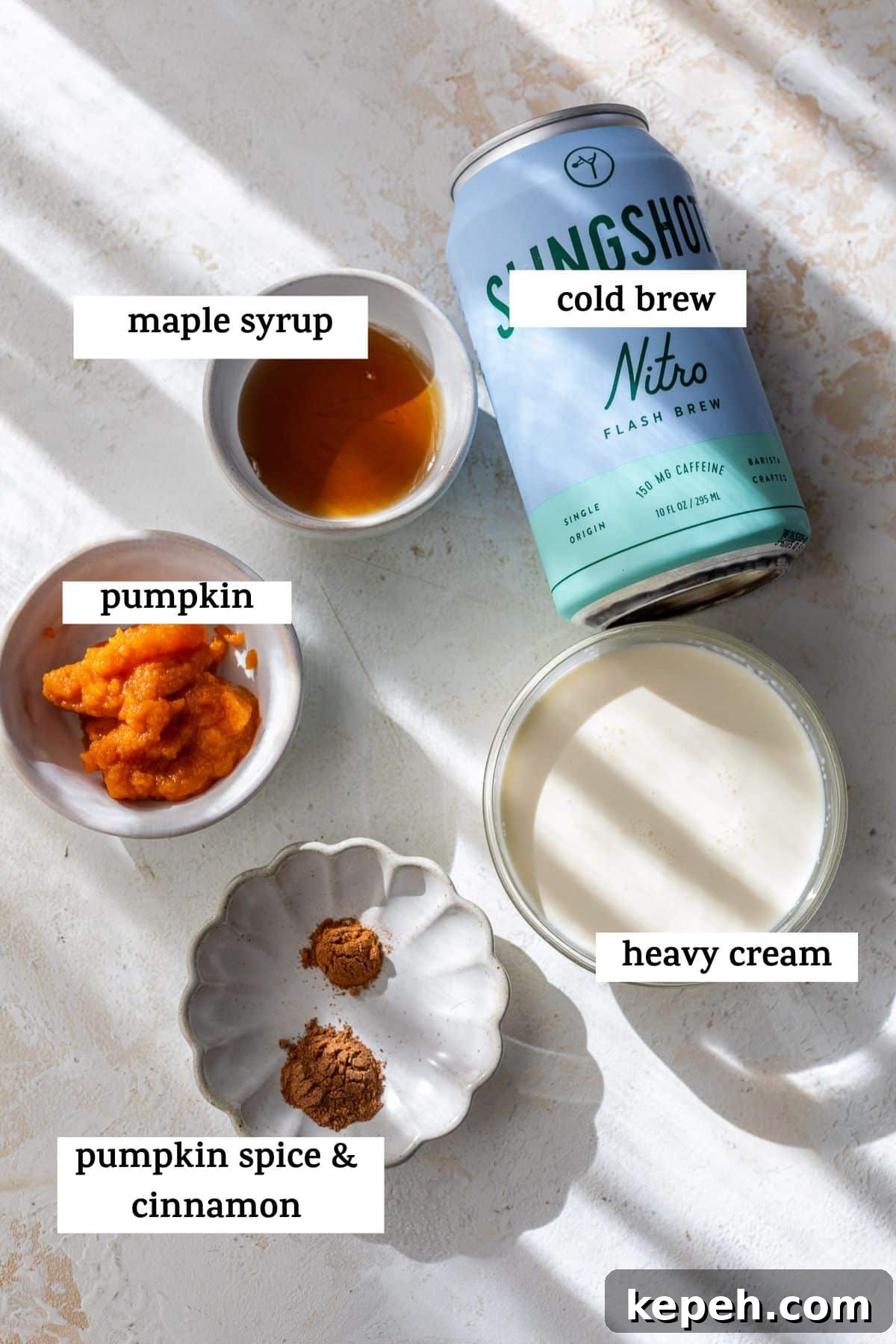 How to Make Pumpkin Cream Cold Brew 4 ingredients for pumpkin cream cold brew with labels.