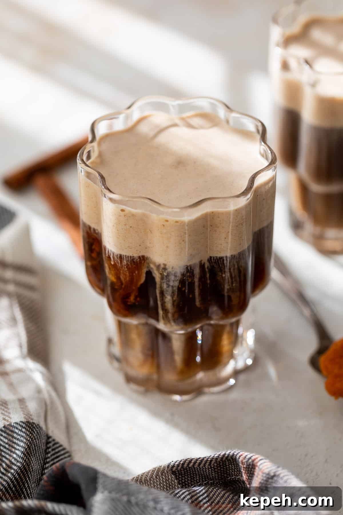 How to Make Pumpkin Cream Cold Brew 8 side view of a glass of pumpkin cream cold brew.