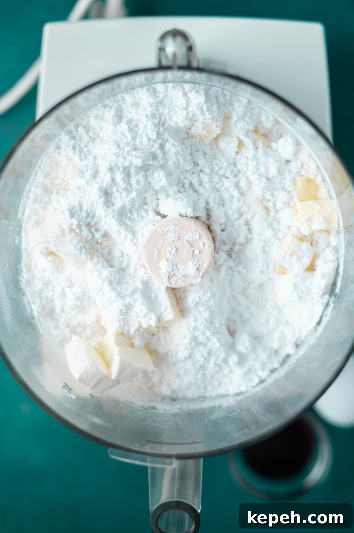 Classic Vanilla Bean Cookies with Old Fashioned Flavor 5 butter, cream cheese, granulated and confectioners' sugar in a food processor bowl