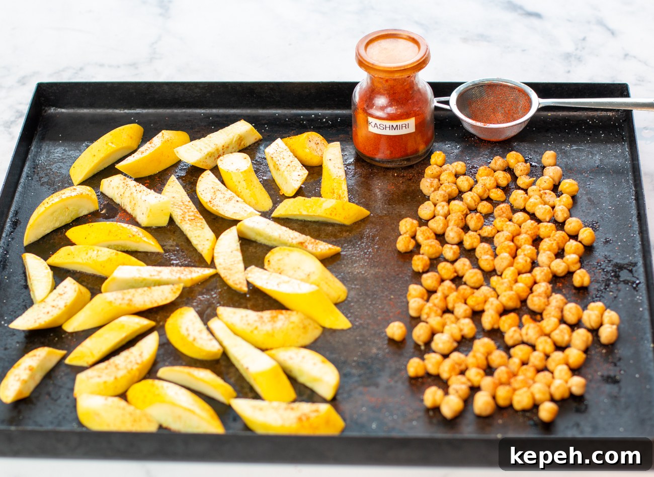 Egyptian Dukkah Sheet-Pan Salmon with Veggies and Chickpeas 8 First step: add chickpeas for crispy texture
